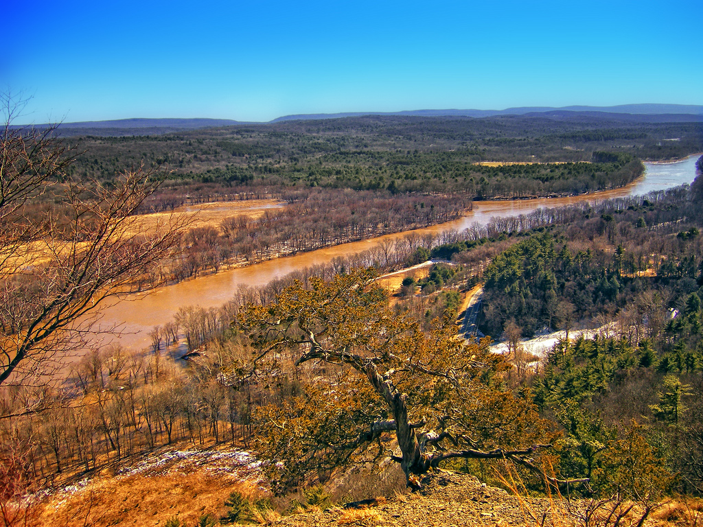 Delaware River Valley as seen from the Cliff Trail, Pike County–Sussex County line, within the Delaware Water Gap National Recreation Area. Two-plus days of heavy rain, combined with rapid snowmelt, left the river swollen and muddy.