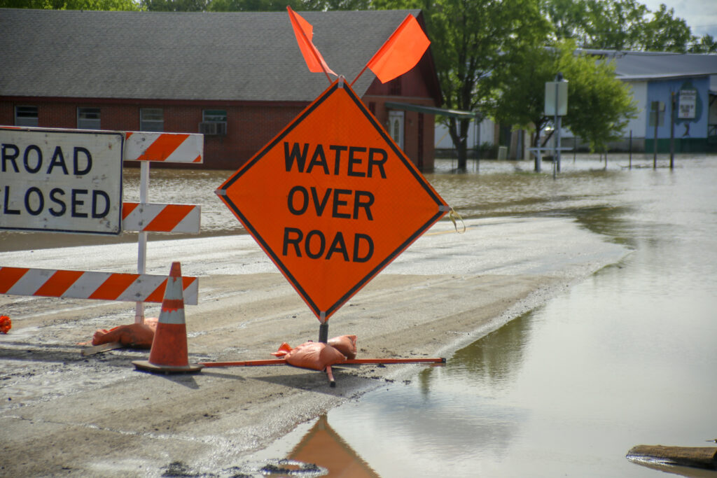 Flooding over a road in Clarksville, IL | Crystal Dorothy