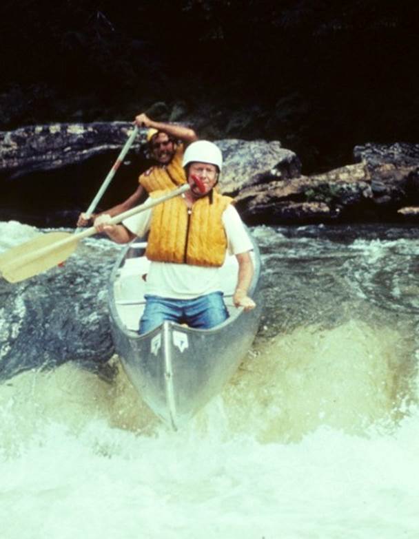 Governor Jimmy Carter and Claude Terry on the first tandem canoe run through the challenging Bull Sluice rapid on the Chattooga River. Photo by Doug Woodward. 