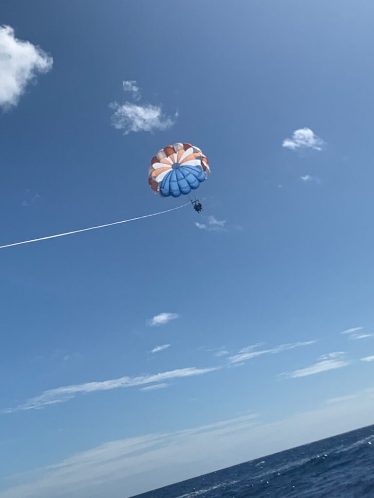 Dr. Tif and her son parasailing off the Island of O'ahu